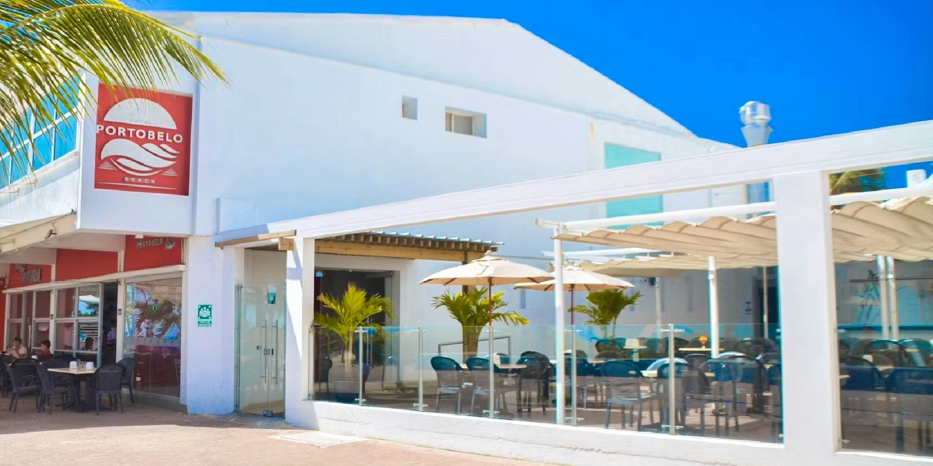 on-vacation-colombia-destino-nacional-san-andres-hotel-portobelo-beach-fachada-lateral.webp